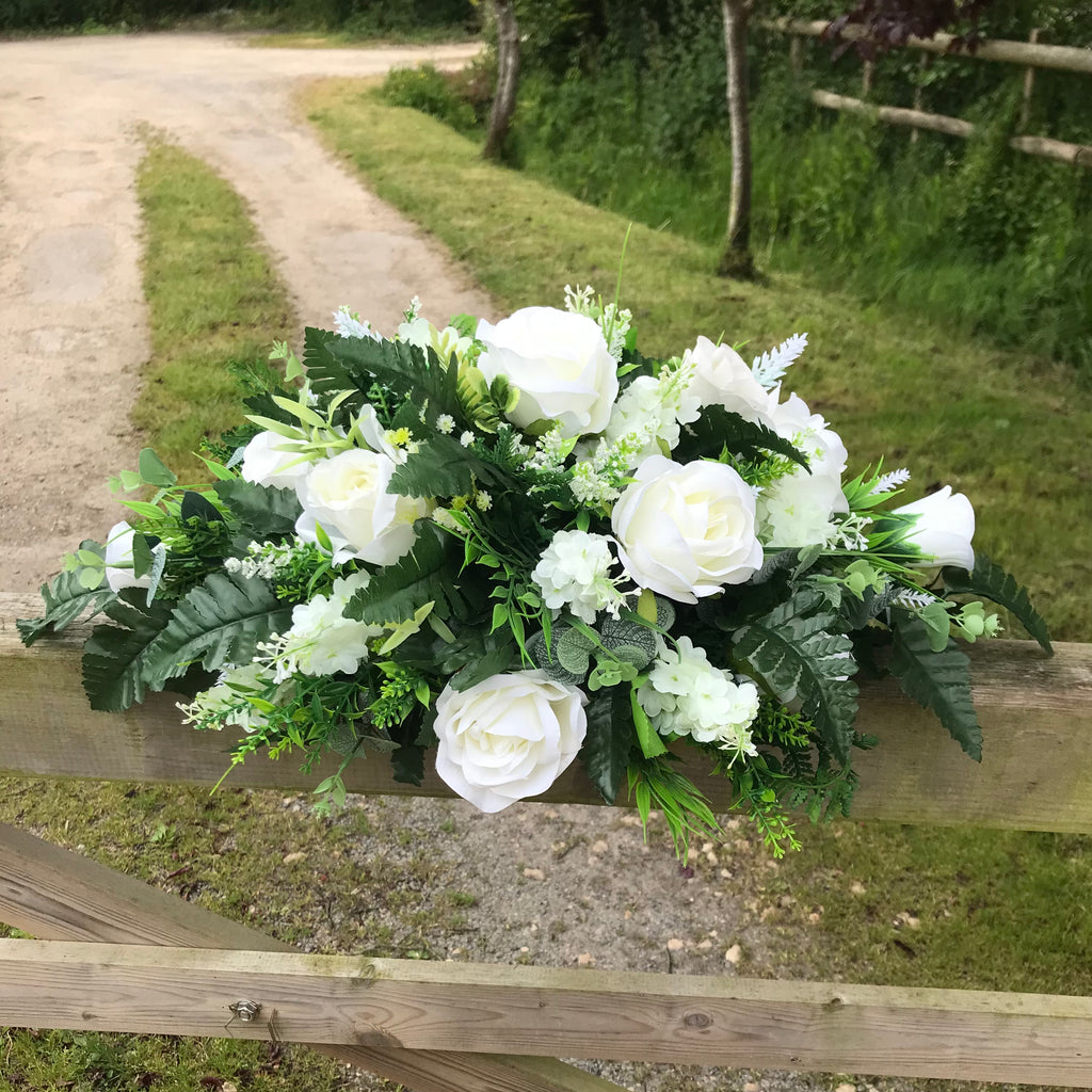 Top table flower arrangement featuring white or ivory roses AbigailRose