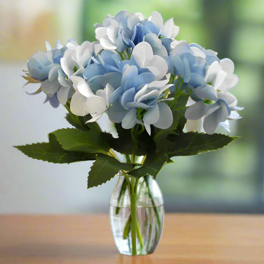an artificial silk flower bush of blue hydrangea flowers AbigailRose