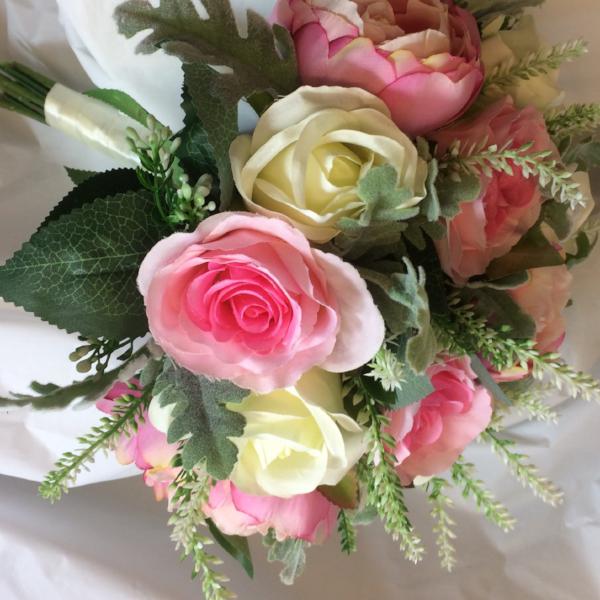 A brides bouquet of pink artificial silk rose flowers AbigailRose