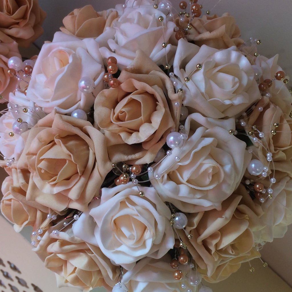 a wedding bouquet collection of cream & gold foam roses & pearls