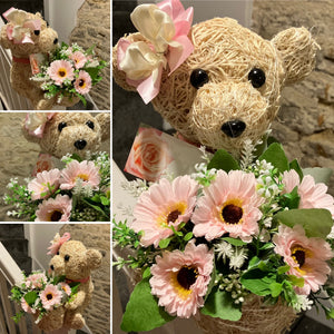 Memorial teddy with flower arrangement for child