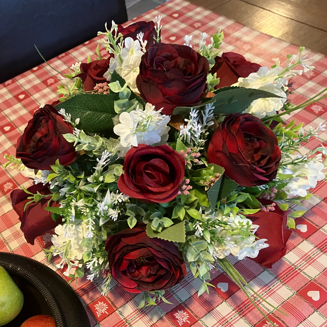 Posy arrangement of burgundy and white artificial silk flowers