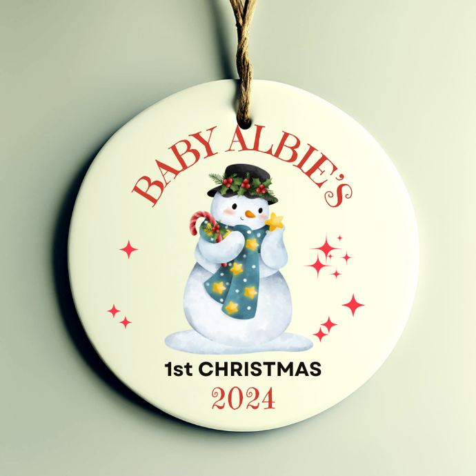 a christmas bauble personalised with year and baby's name