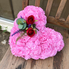 a based memorial heart of roses and carnations in shades of pink & red