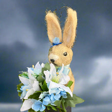 Child’s graveside rabbit memorial planter with flower arrangement