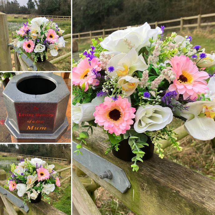 graveside artificial flower arrangement in shades of cream and pink