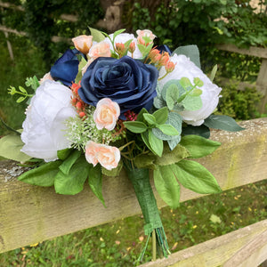 Wedding bouquet of artificial faux silk roses and peony flowers