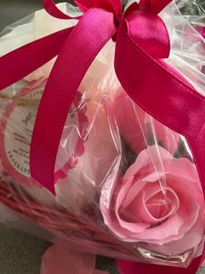 Pamper gift, bath bomb, flannel teddy and soap roses in basket