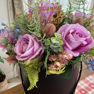 XL flower arrangement of large luxury roses and thistles in hat box