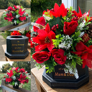 A Christmas memorial flower graveside arrangement