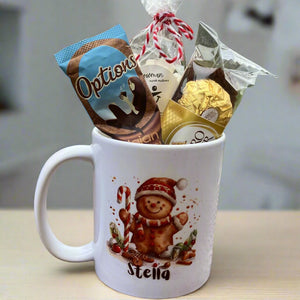 a christmas ceramic mug, hot chocolate marsh mallows, chocolate & sweets