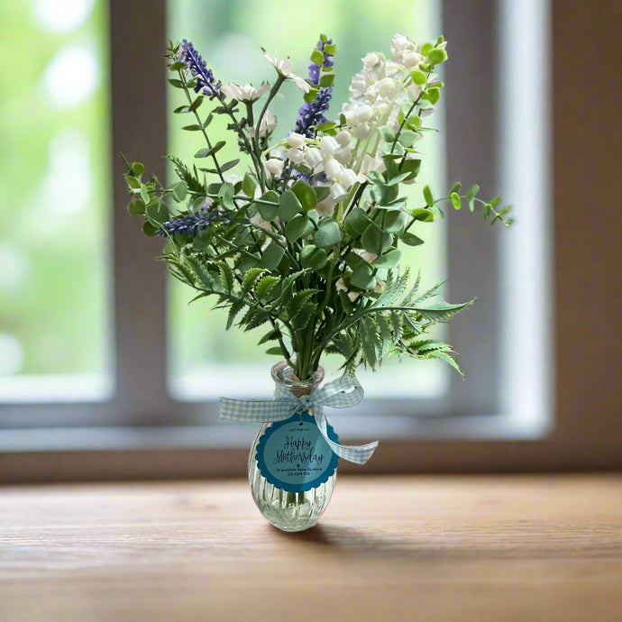 small flower arrangment in glass vase for mothersday