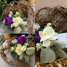 A heart wreath with flower arrangement