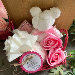 Pamper gift, bath bomb, flannel teddy and soap roses in basket