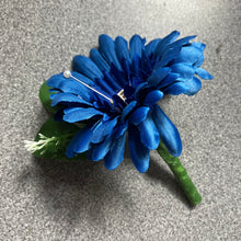 A teardrop wedding bouquet collection of gerbera and daisies