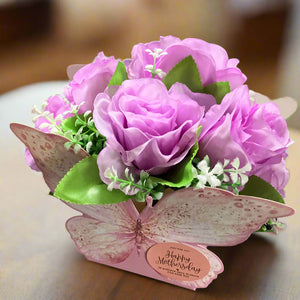 posy of mothersday lilac faux silk lilac roses in butterfly container