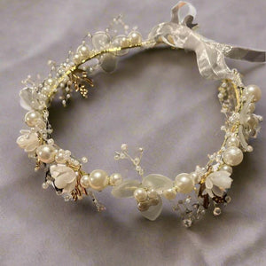 a flower crown of pearls and crystal flowers