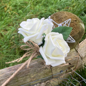 A bridesmaids star wand with ivory roses & hessian handle