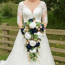 Wedding bouquet of artificial faux silk roses and peony flowers