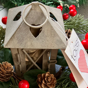 christmas candle ring and rustic lantern ideal as table centre