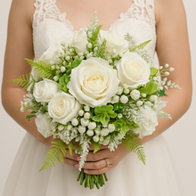 bridal bouquet of artificial white and ivory roses
