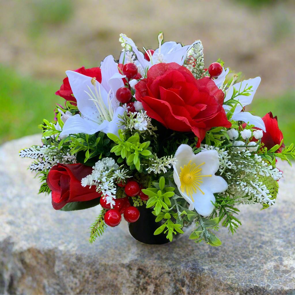 A Grave Side christmas rose & lily memorial flower Arrangement