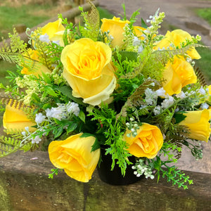 flower arrangements featuring yellow roses