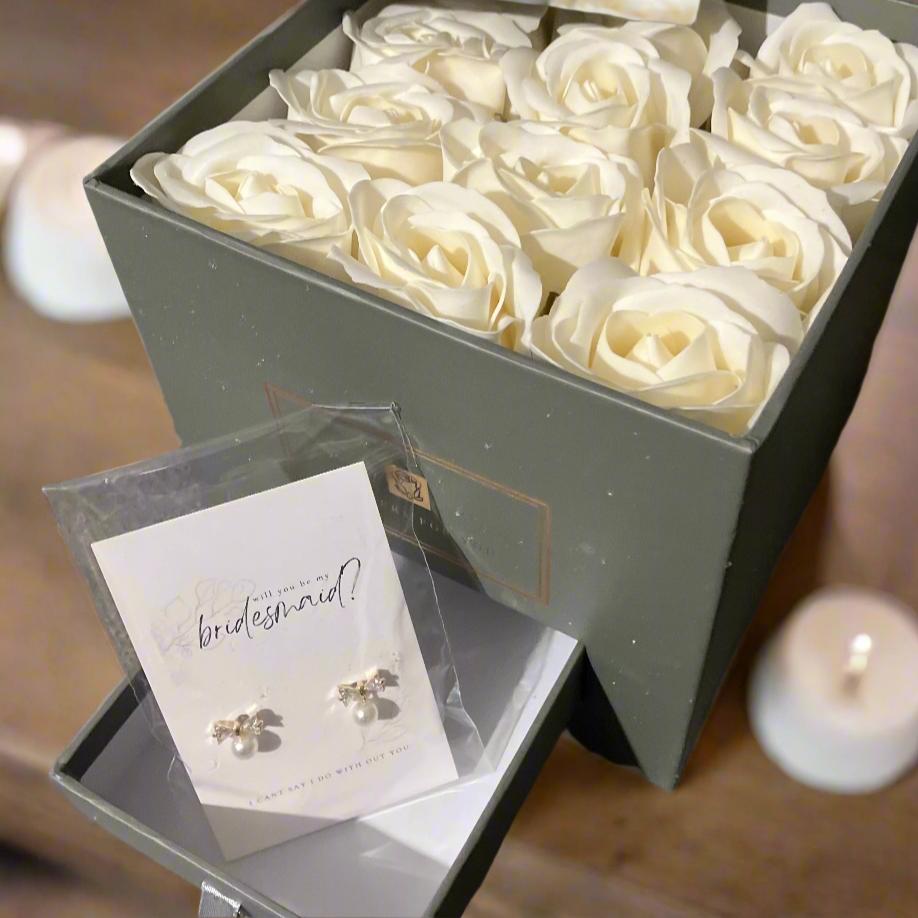 bridesmaid proposal earings and soap roses in hat box