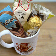 a christmas ceramic mug, hot chocolate marsh mallows, chocolate & sweets