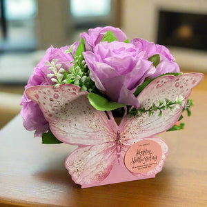 posy of mothersday lilac faux silk lilac roses in butterfly container