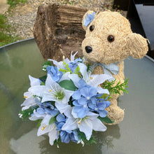 Child graveside memorial teddy with blue or pink flowers