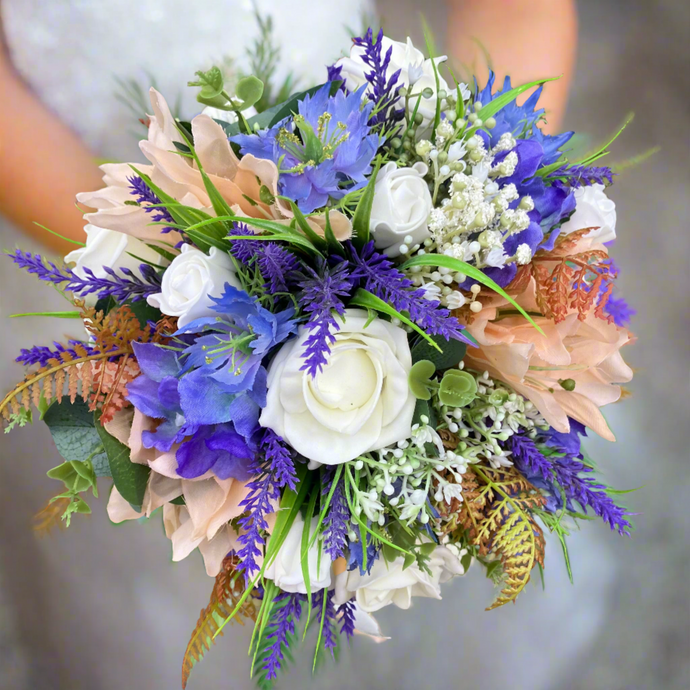 wedding bouquet of artificial purple and peach flowers