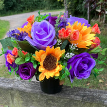 grave pot with faux silk roses and sunflowers