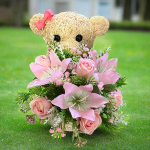 Child graveside memorial teddy with pink or yellow/blue/cream flowers