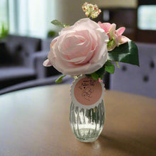 posy of mothersday pink rose and hydrangea in glass vase