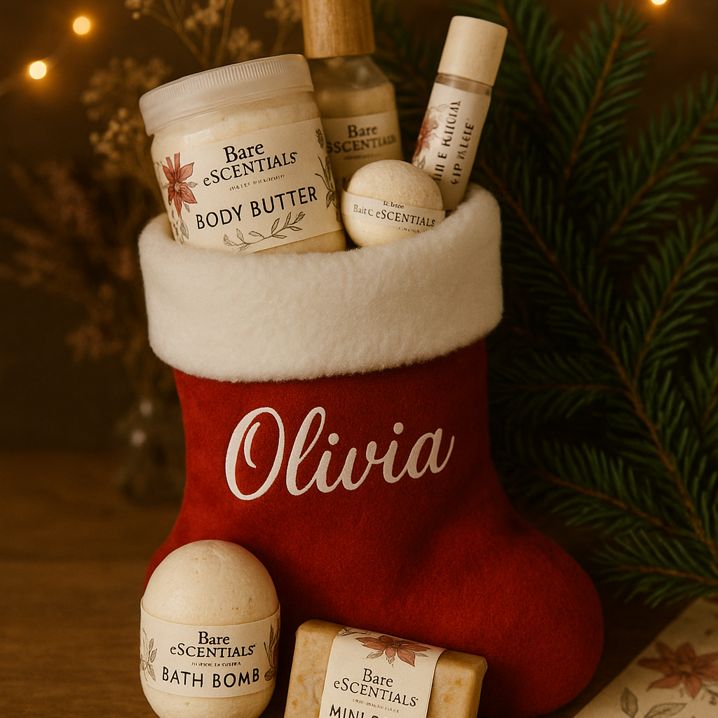 Personalized red stocking filled with Bare Essentials body care products on a wooden surface with decorative lights and greenery.