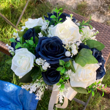 A teardrop bouquet of navy and ivory artificial roses flowers
