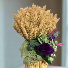 handtied bunch of natural wheat and flower arrangment