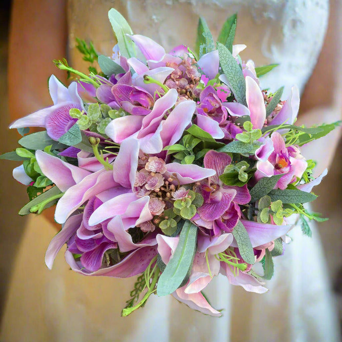 wedding bouquet of artificial orchids and lilies