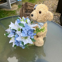 Child graveside memorial teddy with blue or pink flowers