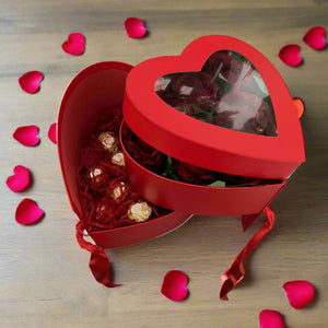 red heart box with red roses and ferror rocher chocolate