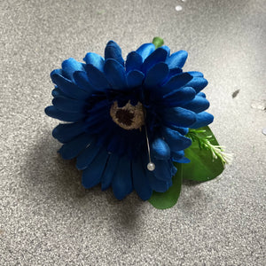 A teardrop wedding bouquet collection of gerbera and daisies