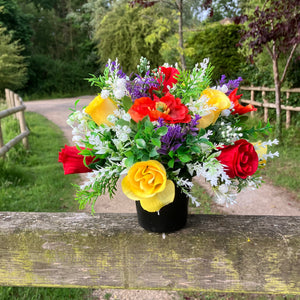 faux silk graveside flower arrangement in black pot