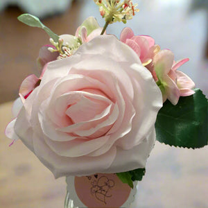 posy of mothersday pink rose and hydrangea in glass vase