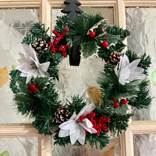 artificial pine christmas wreath with white poinsettia and berries