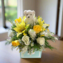New baby boy yellow and blue flower arrangement in alphabet cube
