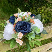 Wedding bouquet of artificial faux silk roses and peony flowers