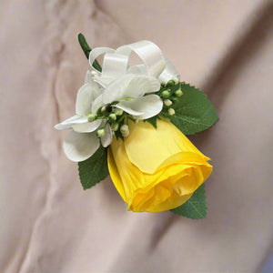 A wedding bouquet collection of yellow and ivory silk flowers