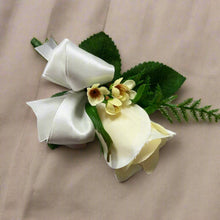 An artificial lemon rose buttonhole