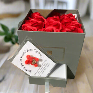 12 red Rose Soap flowers in grey hat box with tiny teddy gift